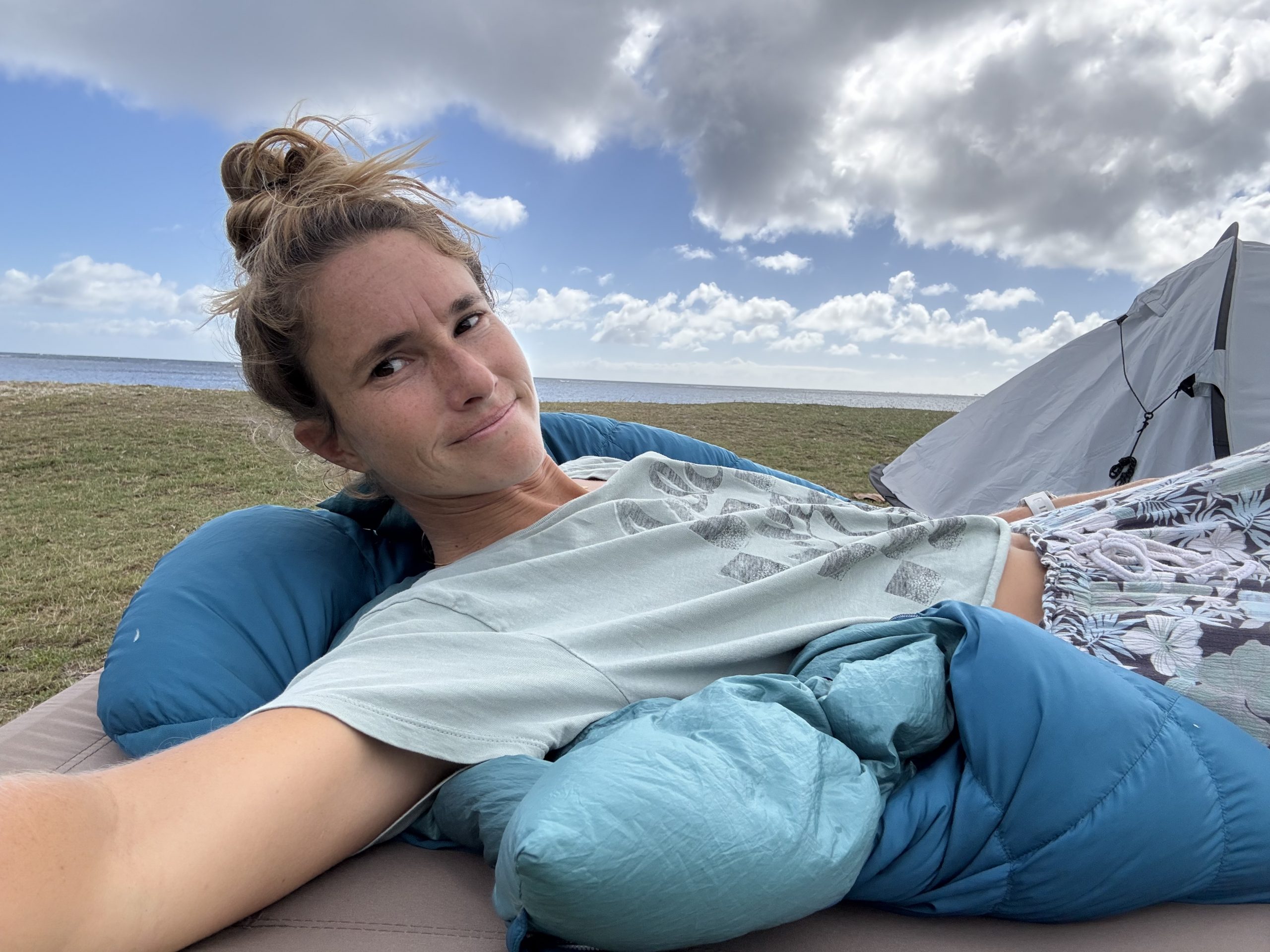 a girl lying on a cot
