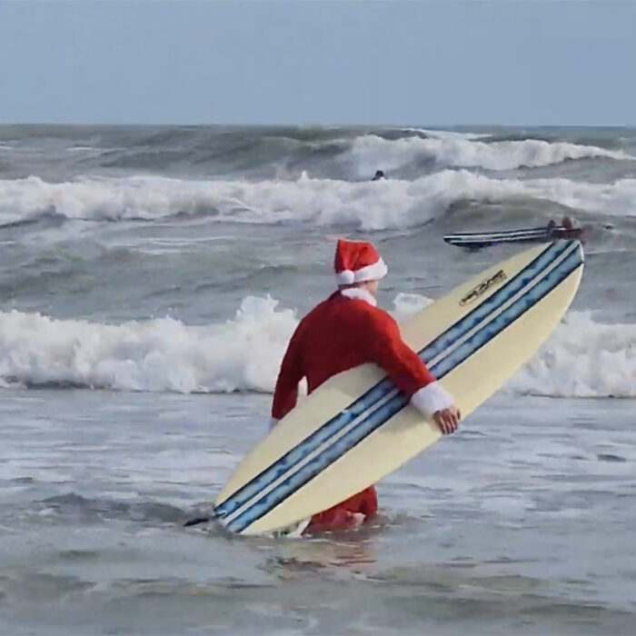 Photo: Surfing Santas // YouTube