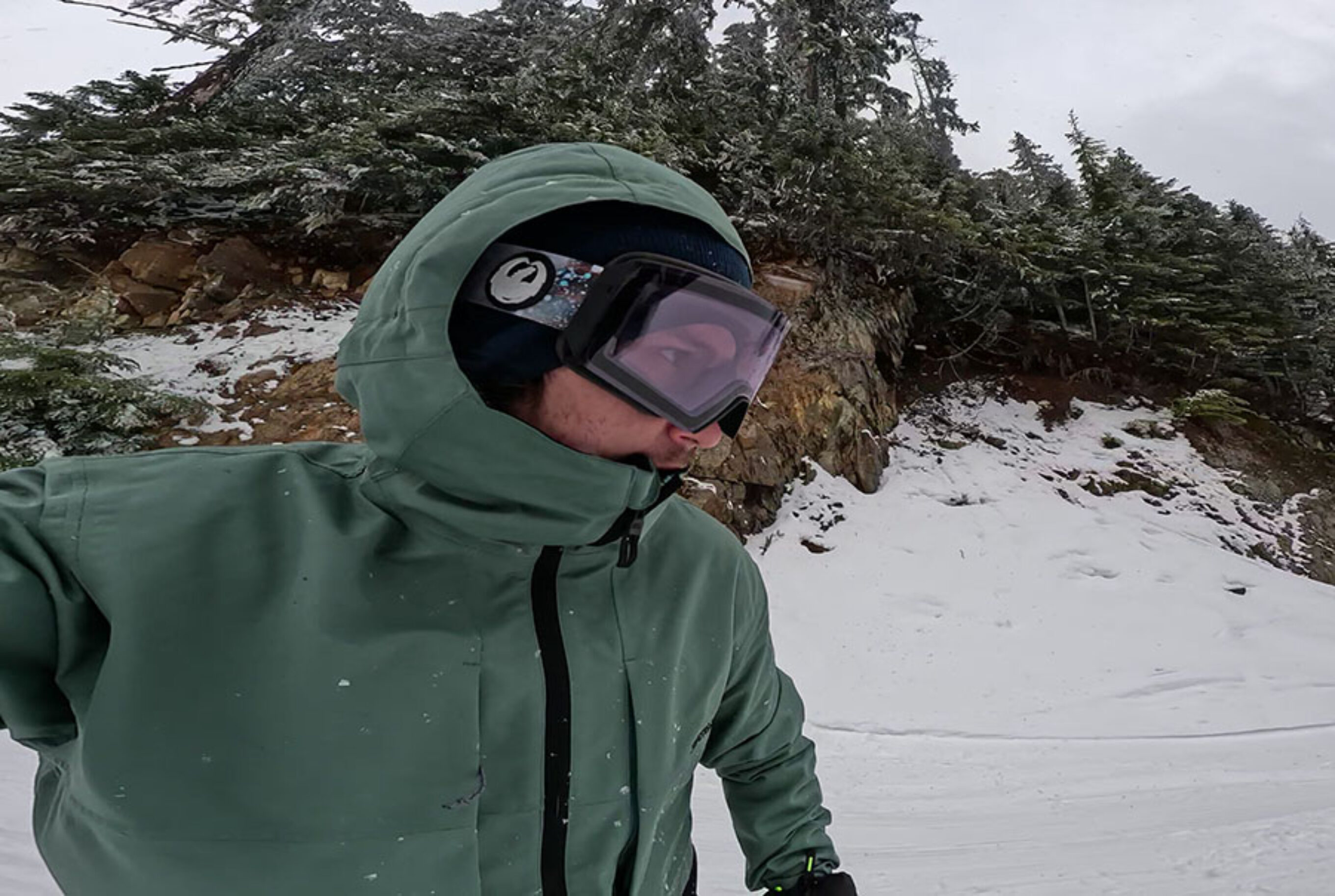 man taking selfie in snowboard jacket