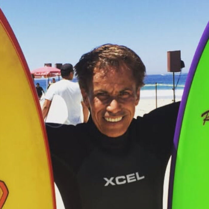 Reno Abellira with surfboards