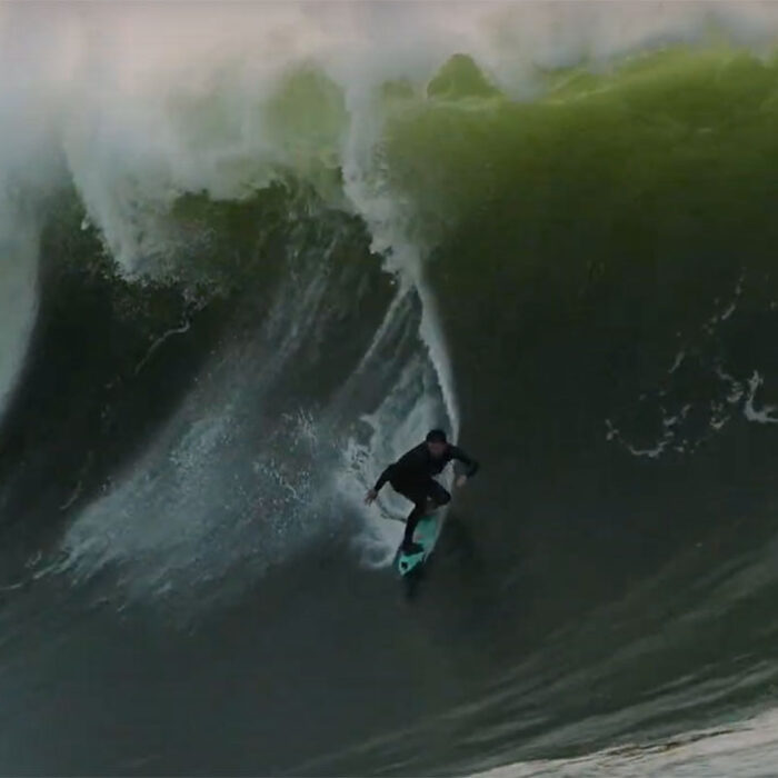 Sage Burke surfing Maverick's left
