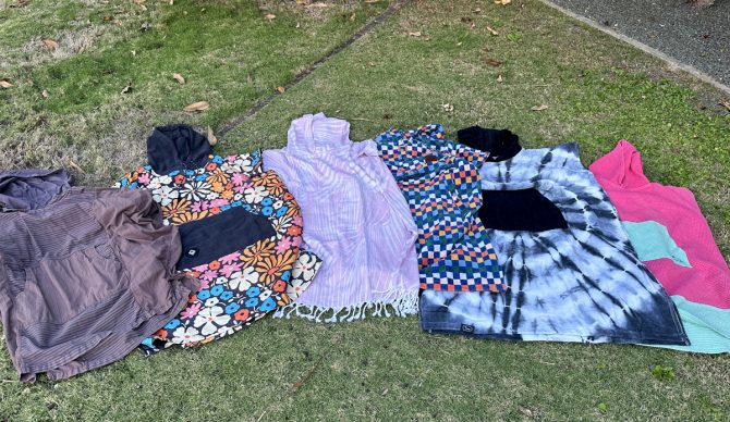 surf ponchos on the grass