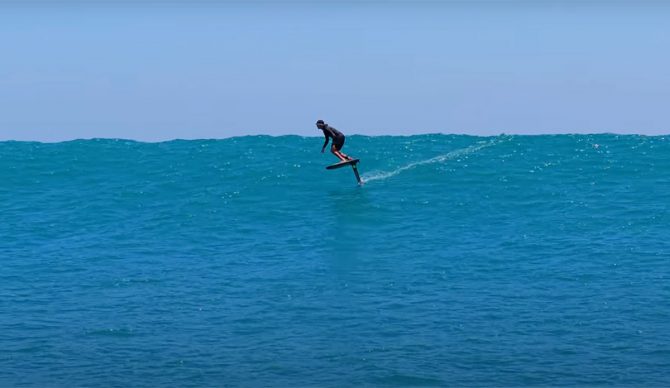 Adam Bennetts on a foilboard at Uluwatu