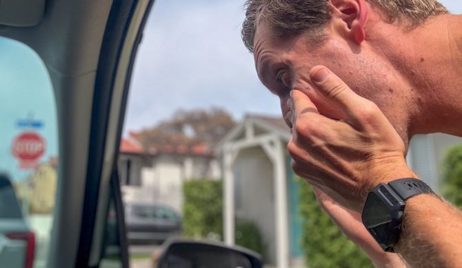 putting on sunscreen with the Rip Curl Search GPS3