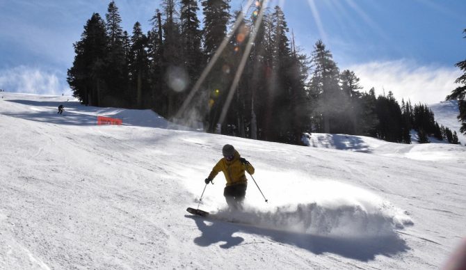 Skiing in the Mountain Hardwear High Exposure Bibs