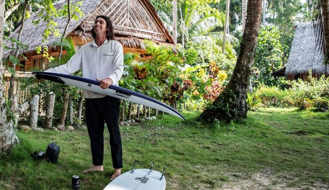 Craig Anderson at Alaia Mentawai with surfboards