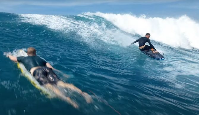 Cam Scott surfing on a finless surfboard in NoFINDO