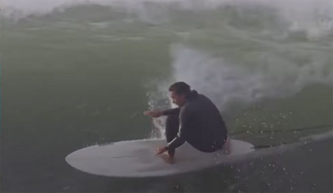 Devon Howard surfing a midlength surfboard