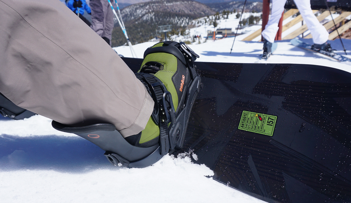 view of snowboard boots in bindings