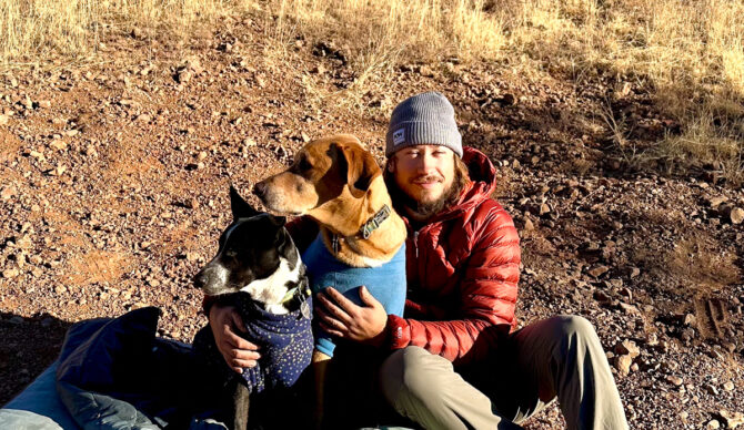 Nate and the dogs in the REI Magma 850 down jacket