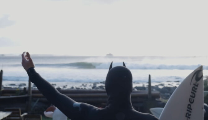 Reed Platenius watching a wave break on Vancouver Island