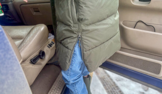 REI Campwell Down Parka side zip on truck