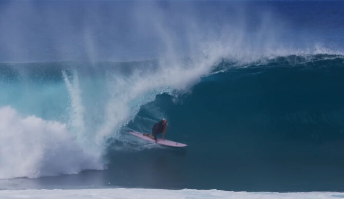 Jamie O'Brien surfing a Fun Day surfboard at Pipeline