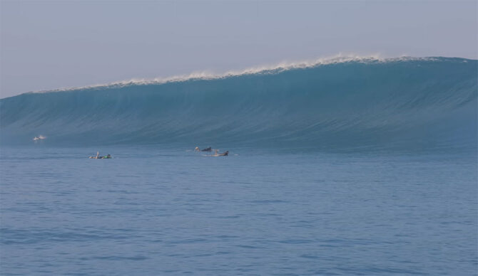 Koa Rothman and his friends paddling out to an outer reef in Hawaii to surf