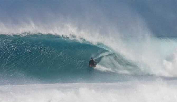 Bodyboarder riding a a barrel in Cape Town, South Africa
