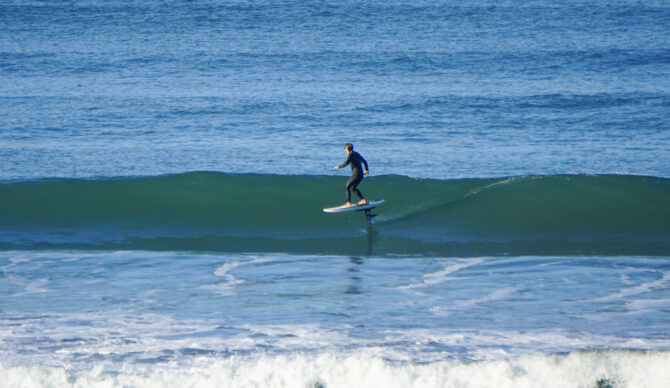 Bowen riding the Foil Drive Fusion and Armstrong Integrated Mast at Ocean Beach, San Francisco