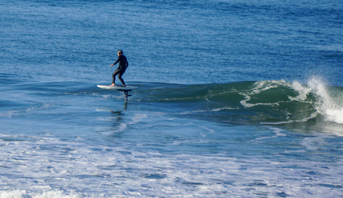 Bowen riding the Foil Drive Fusion and Armstrong Integrated Mast at Ocean Beach, San Francisco