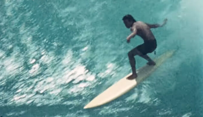 Hawaiian surfer riding a wave in 1974