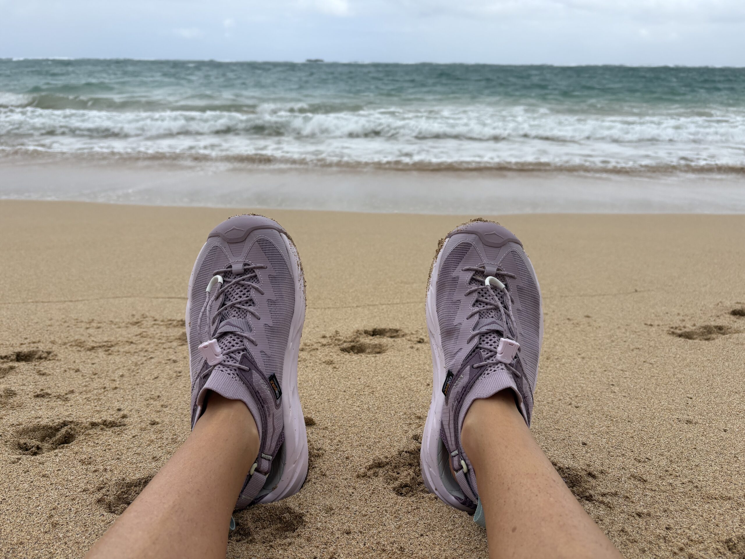 hoka sandals at the beach