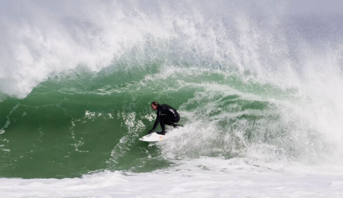 Jordy Smith surfing a beach break in South Africa