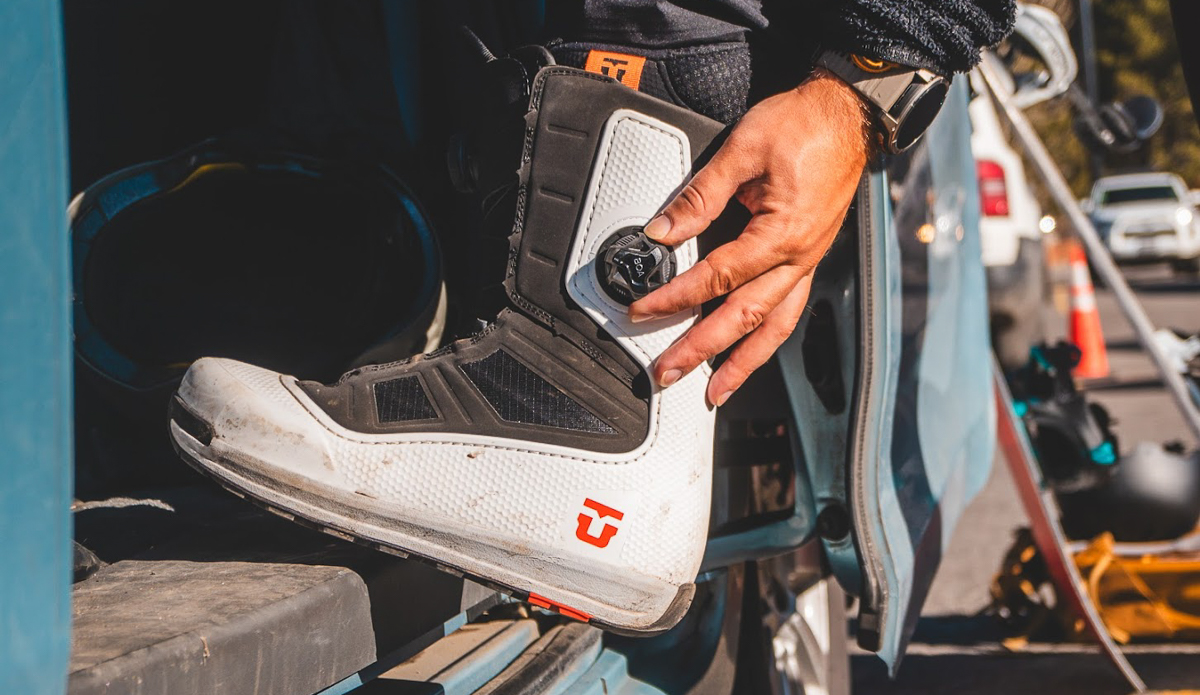 adjusting BOA dial on snowboard boots