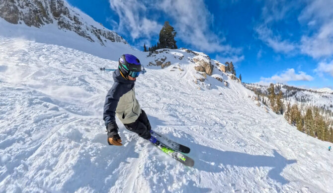 Skiing in the flylow malone jacket