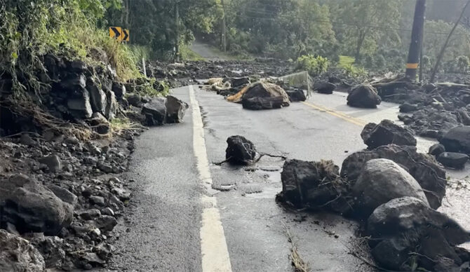 Hawaii road blocked by rocks after flooding