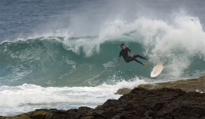 Gold Coast surfer wiping out at Snapper Rocks