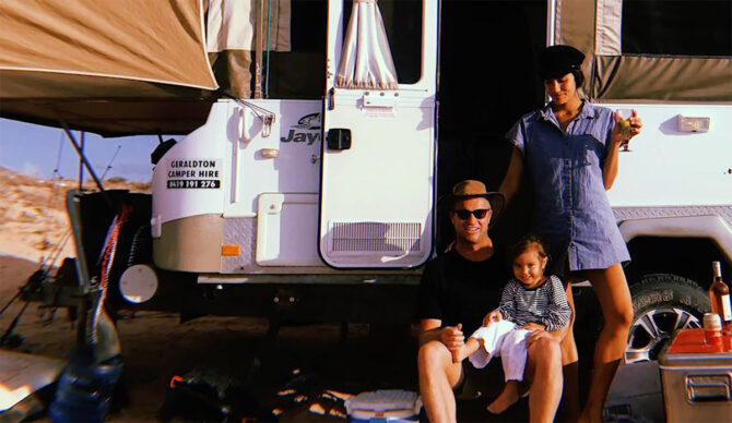 Taj Burrow sitting with his family