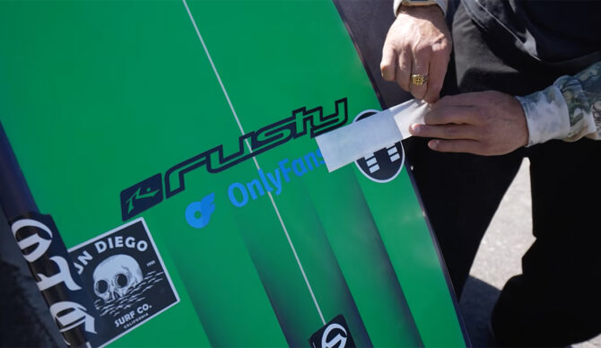 Zeke reveals a new sticker on his quiver. Photo: Jacob Szekely // YouTube