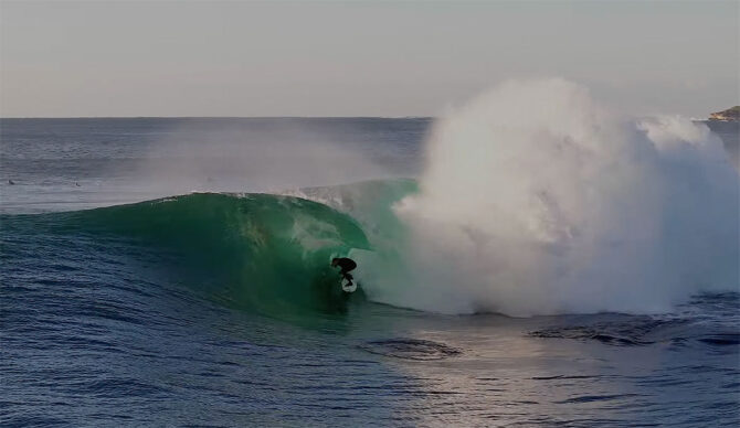 Kipp Caddy surfing Shark Island