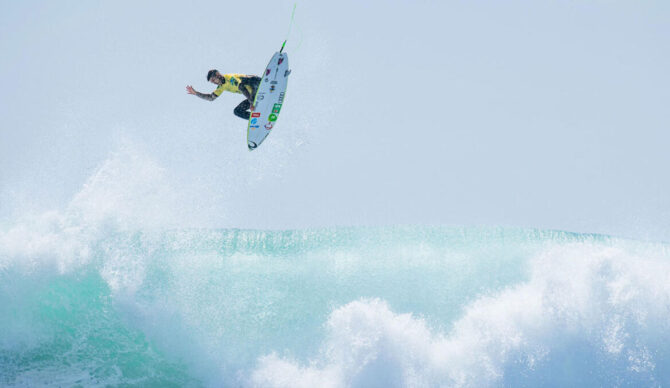 Gabriel Medina doing an aerial maneuver