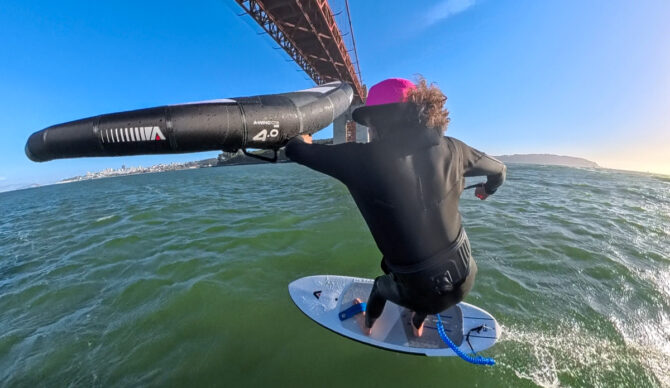 wing foiling under the golden gate bridge