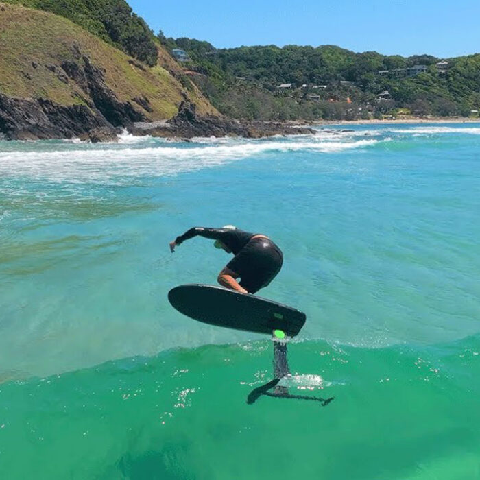 Adam Bennetts surfing a foil board