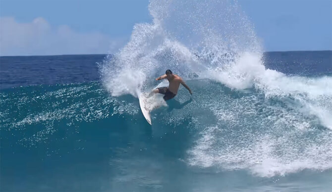 Jordy Smith doing a turn in the Mentawai Islands
