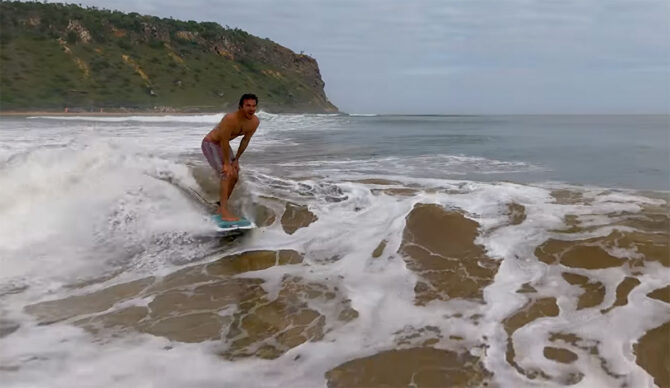 Luis Perloiro surfing a wave in Angola