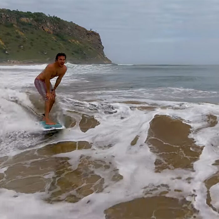 Luis Perloiro surfing a wave in Angola