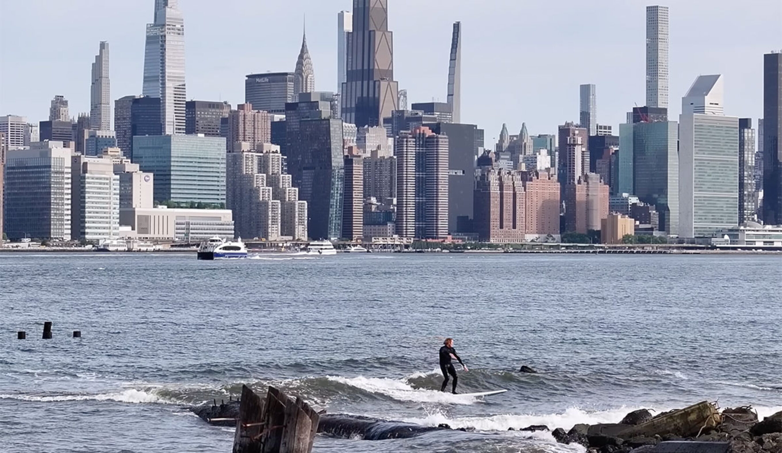 Ben Gravy surfing a wave in New York