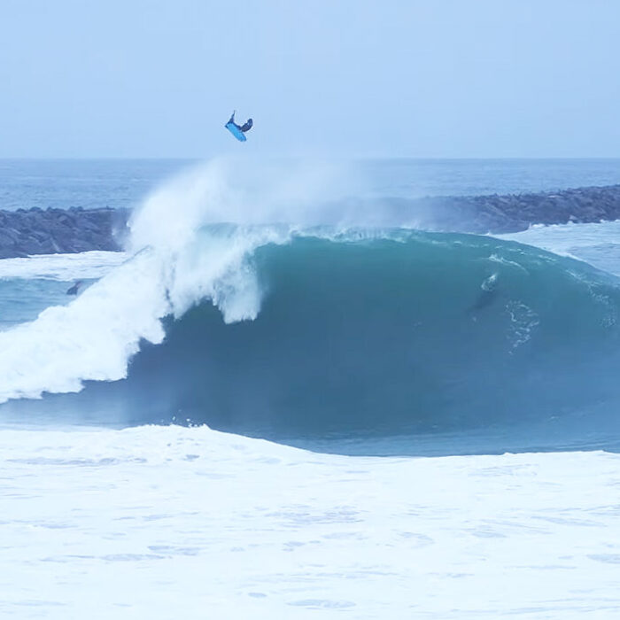 bodyboarder doing a backflip at the Wedge
