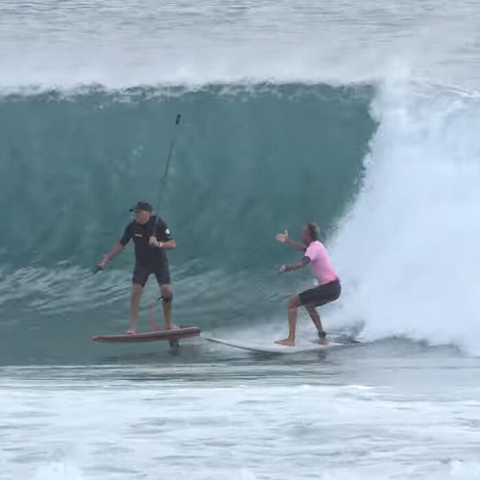 Gold Coast surfers on a wave