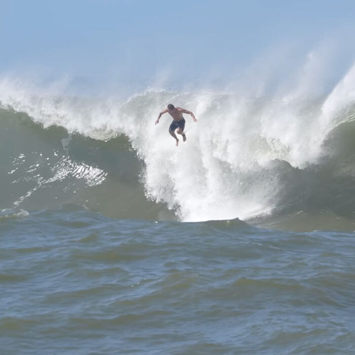 Koa Rothman jumping off wave at Ala Moana Bowls