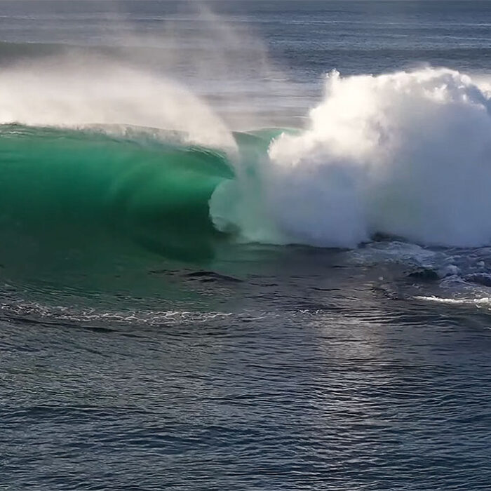 Shark Island waves breaking over shallow reef