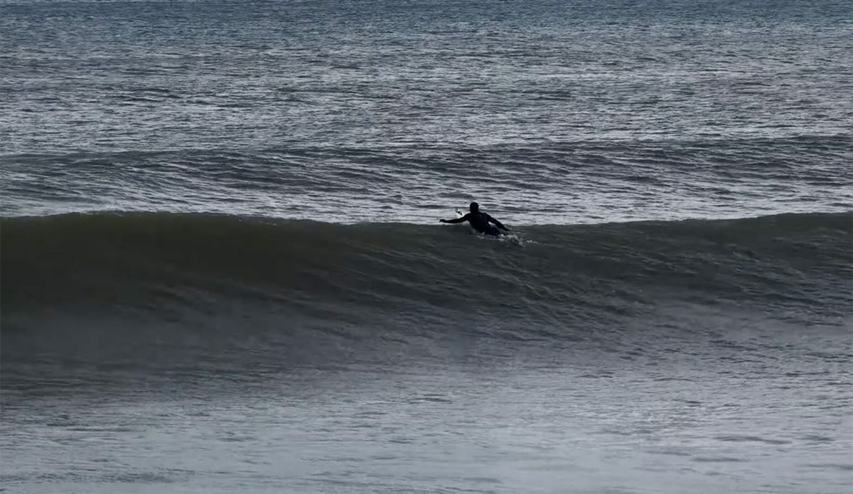 Torrey Meister surfing the Bering Sea