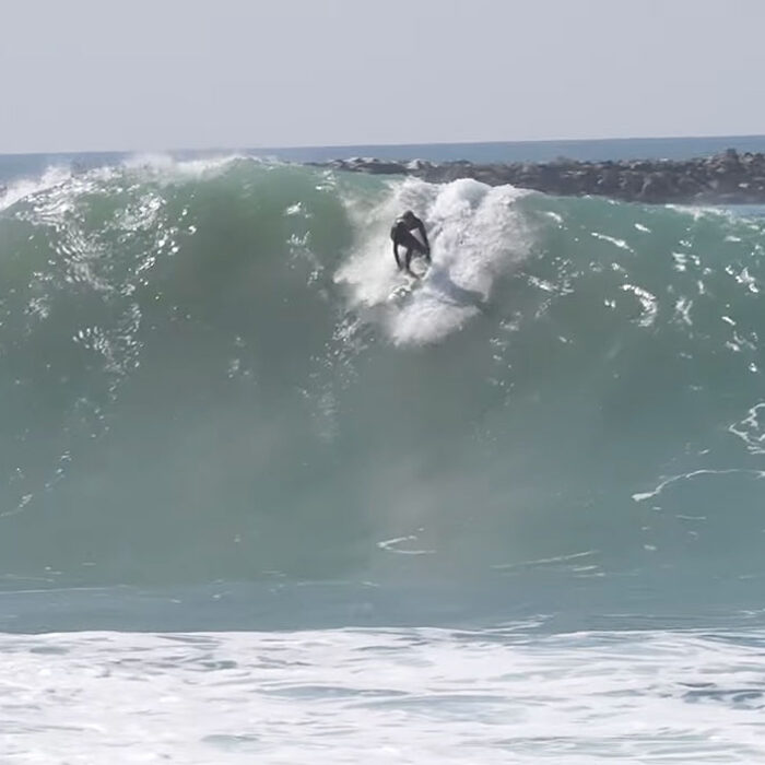 The Wedge with waves from Hurricane Genevieve