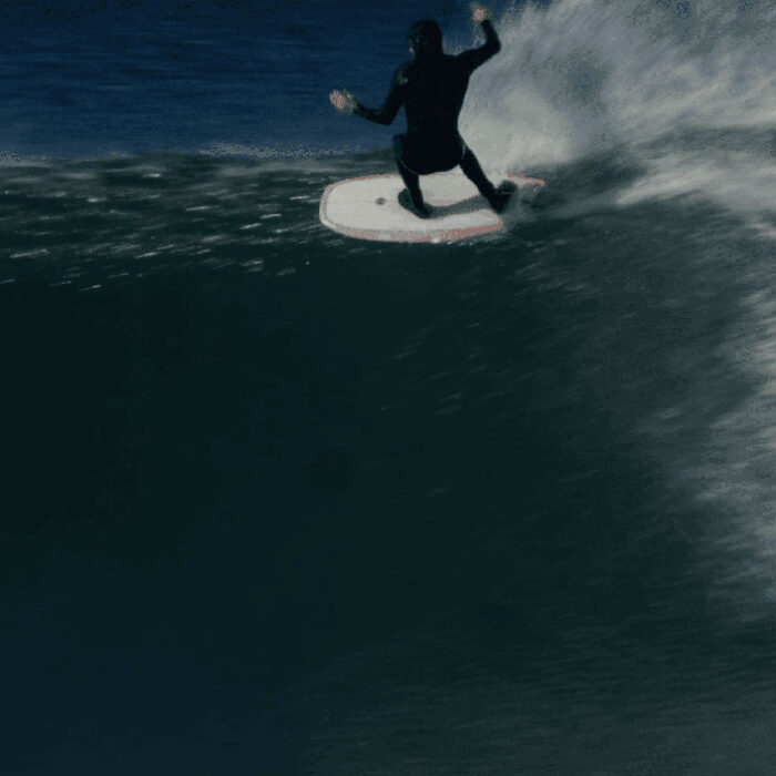 Torren Martyn surfing on a biscuit