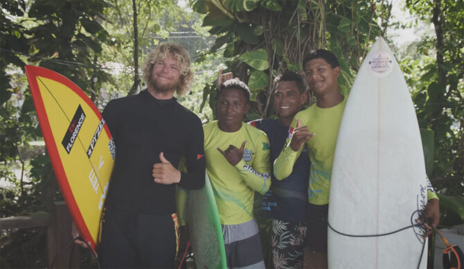 John John Florence with surfers in Panama