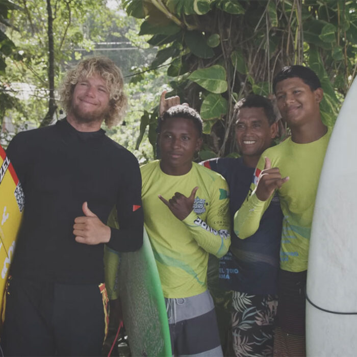John John Florence with surfers in Panama