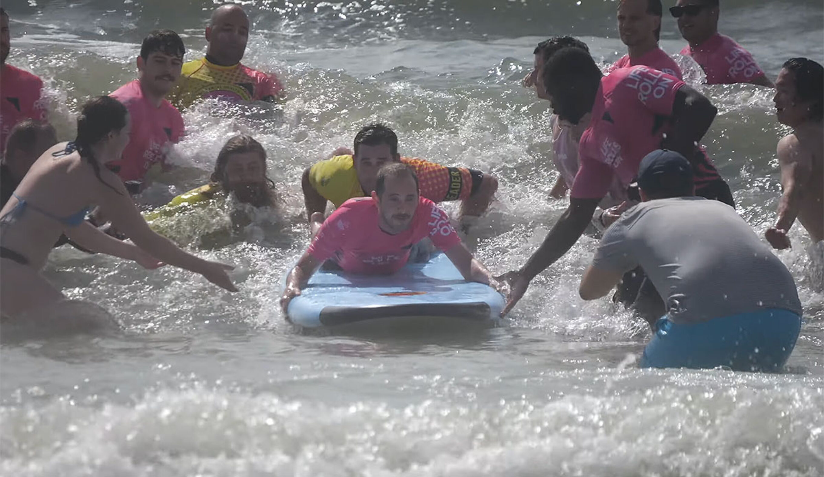 Makki surfing for the first time since spinal cord injury