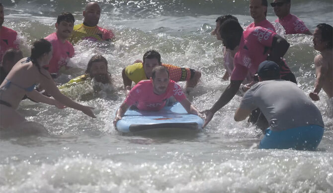 Makki surfing for the first time since spinal cord injury