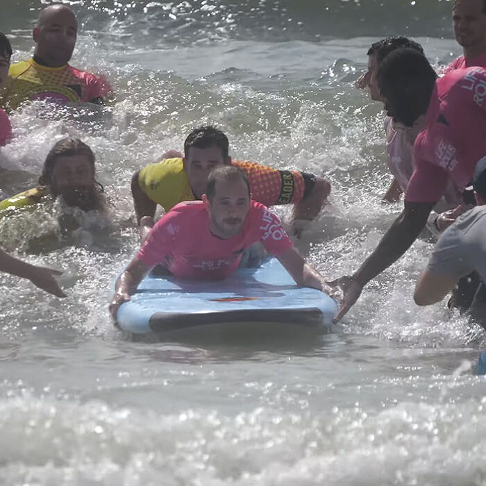 Makki surfing for the first time since spinal cord injury